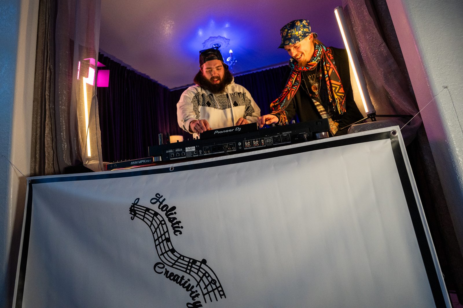 Two retreat attendees DJing together